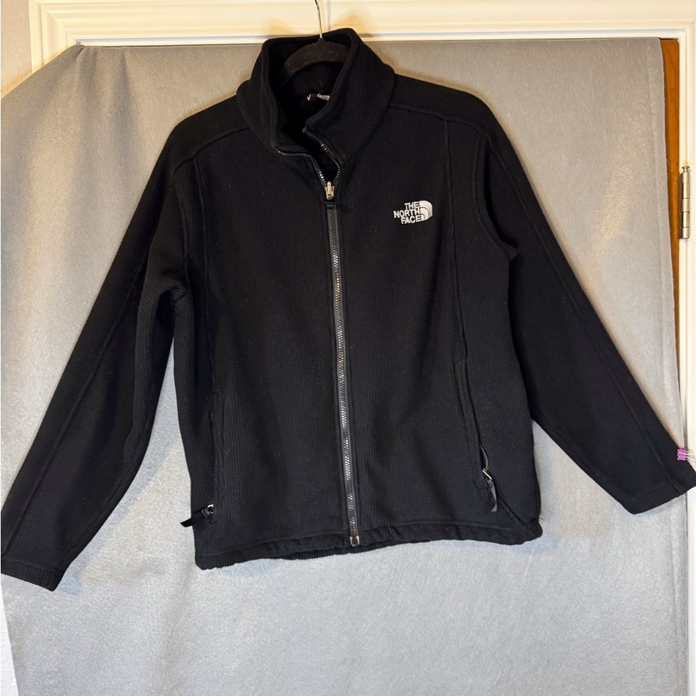 The North Face Black Textured Jacket. Very Good Used Condition.